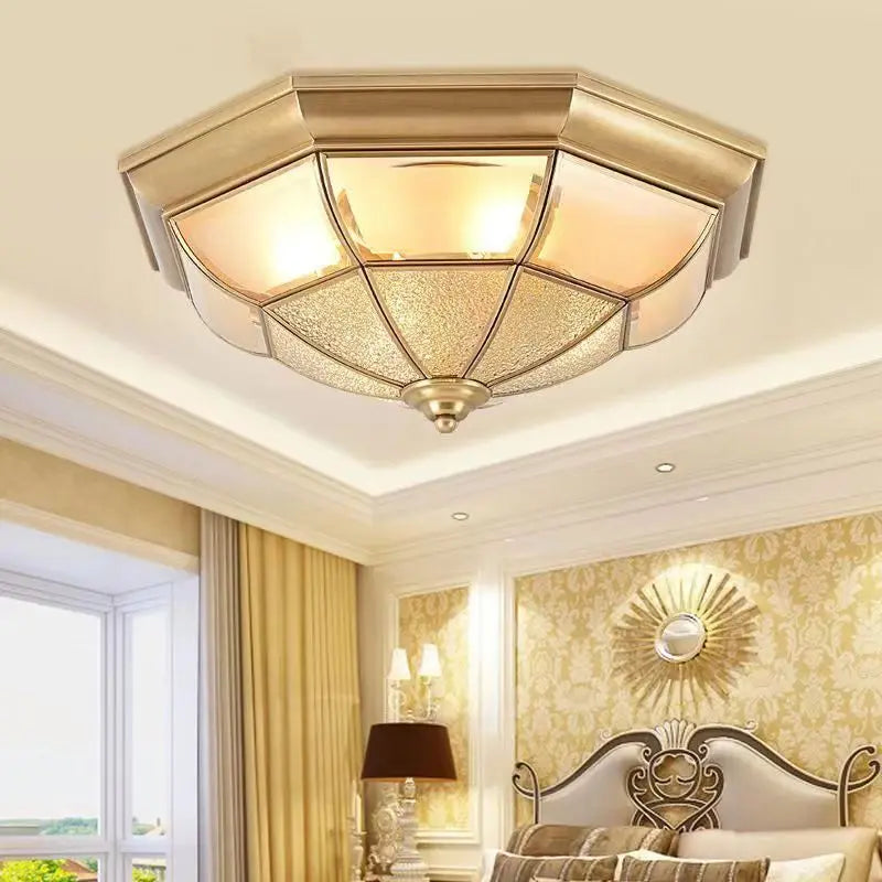 Ceiling light fixture in a bedroom with decorative elements