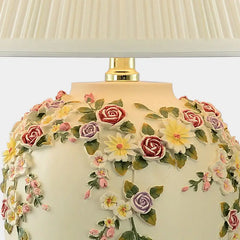 Decorative lamp with floral design on a white background