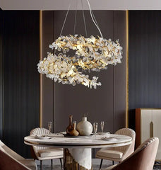 Modern dining room with a stylish chandelier and round table.