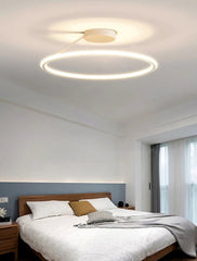 Modern bedroom with a ceiling light fixture