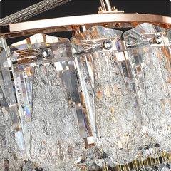 Close-up of a crystal chandelier with clear and gold accents