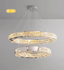 Chandelier with three circular rings on a gray background