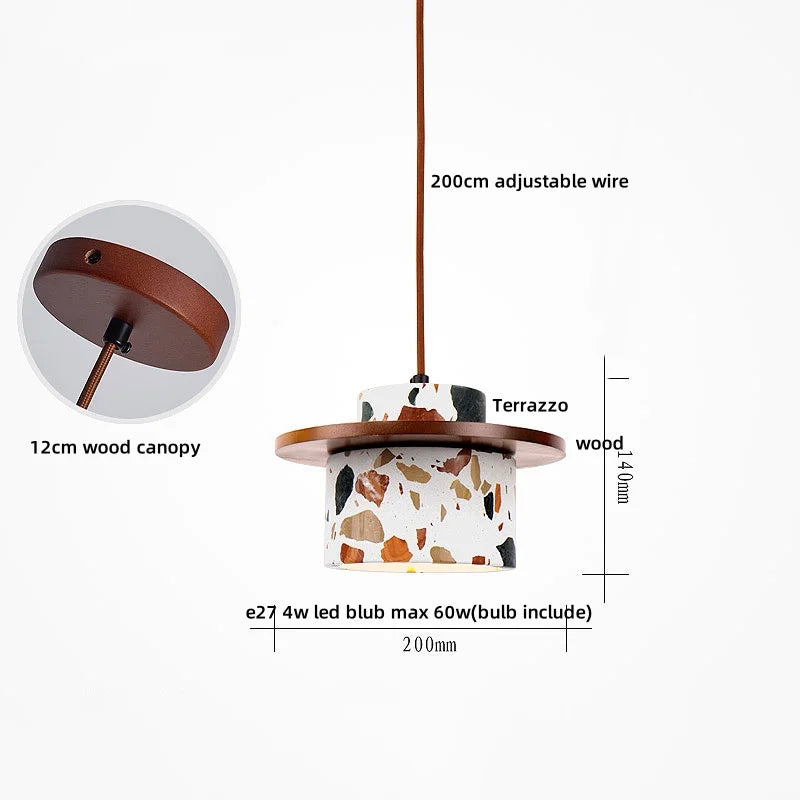 Pendant light with terrazzo design, wood canopy, and adjustable wire on a white background