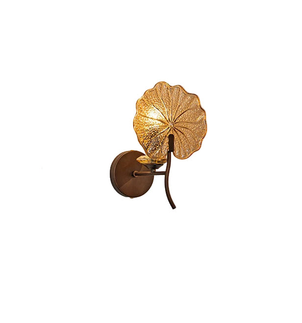Decorative wall sconce with leaf design on a white background