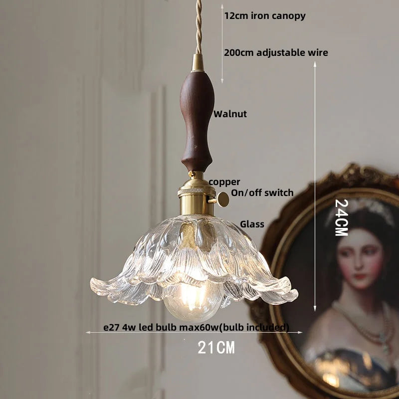 Vintage-style pendant light with clear glass shade and wooden canopy, shown with measurements.