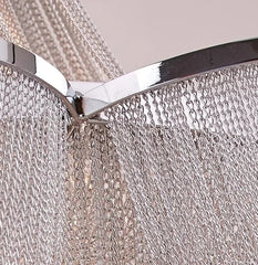 Close-up of a metallic mesh filter with a silver rim.