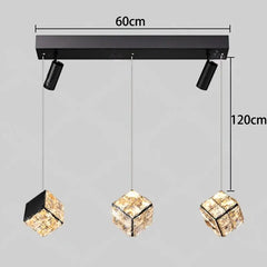 Ceiling light fixture with three crystal lights and dimensions on a gray background