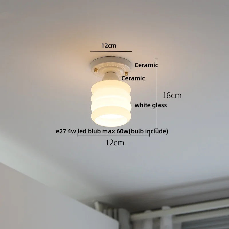 Ceiling light fixture with dimensions labeled on a white ceiling.