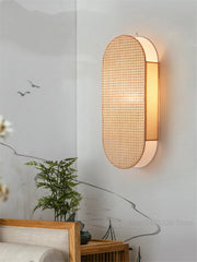 Wall-mounted lamp with a textured design in a room setting