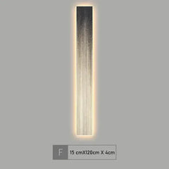 Wall-mounted light fixture with dimensions displayed on a gray background