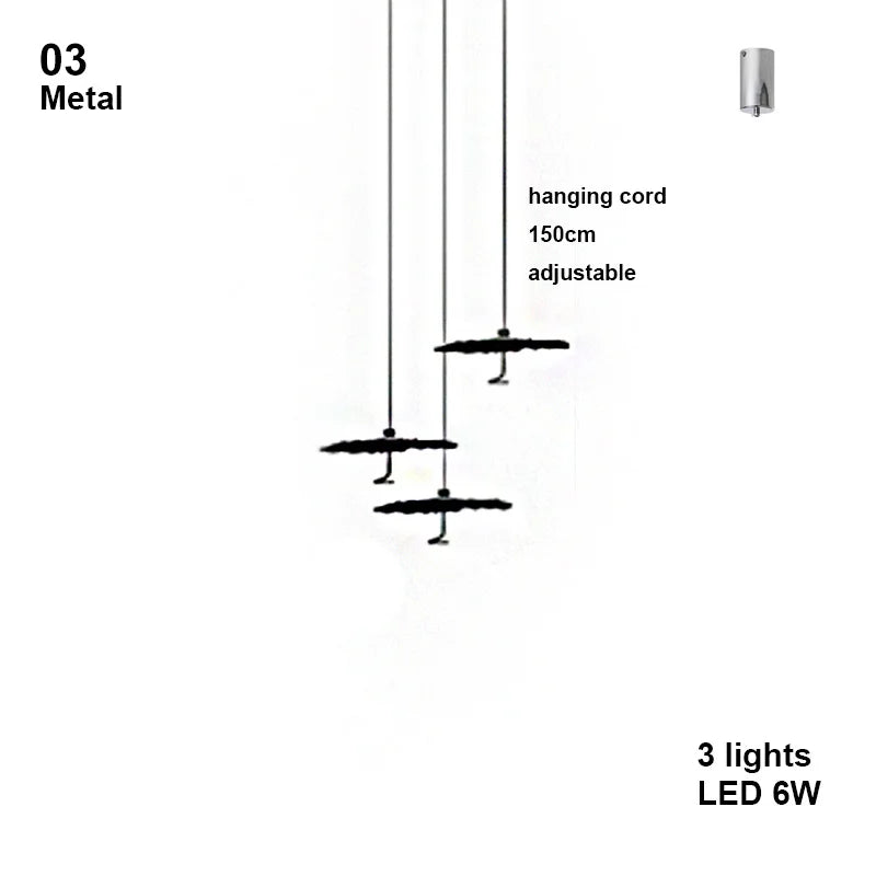 Diagram of a metal pendant light with hanging cord and LED lights on a white background.