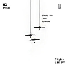 Diagram of a metal pendant light with hanging cord and LED lights on a white background.