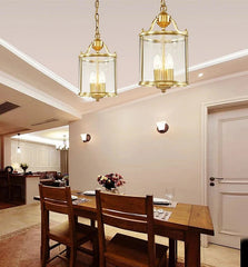 Gold Lantern Pendant Light with Clear Glass Shade and Metal Frame