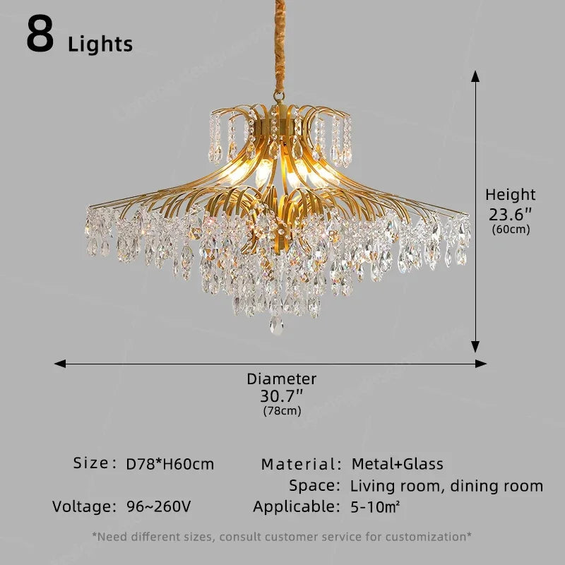 Gold chandelier with crystal accents and dimensions on a gray background