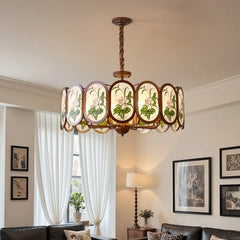 Bronze Chandelier with Frosted Glass and Green Leaf Floral Accents