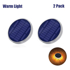 Two solar panel lights with warm light effect on a white background