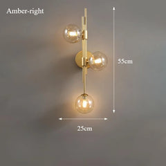 Modern Gold Brass Sconce with Three Frosted Globe Shades