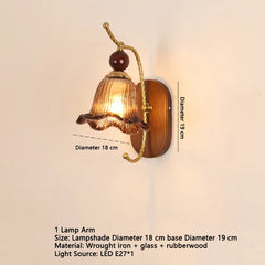 Gold Floral Glass Wall Sconce with Wood Backplate and Amber Bell Shade
