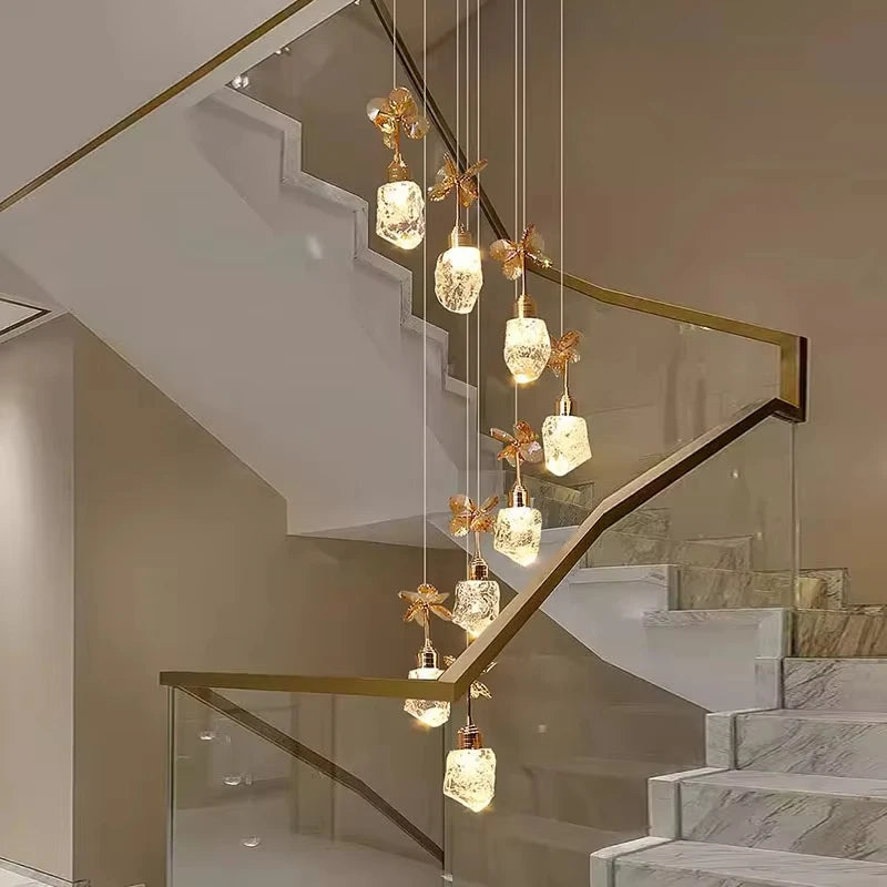 Modern staircase with decorative pendant lights in a home setting