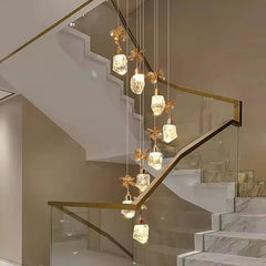 Modern staircase with decorative pendant lights in a home setting