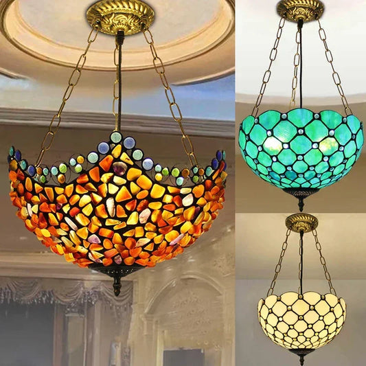 Collage of three Tiffany-style pendant lights: one with orange and yellow stone-like glass, one in green, and one in cream with a diamond pattern.