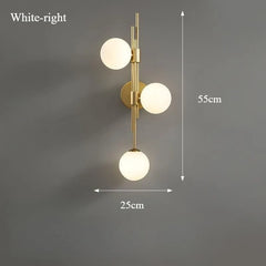 Modern Gold Brass Sconce with Three Frosted Globe Shades