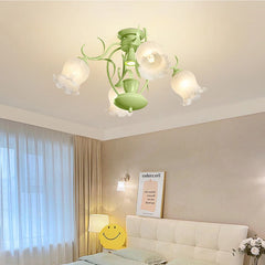 Green floral tulip semi-flush ceiling light installed in a bedroom setting above a bed