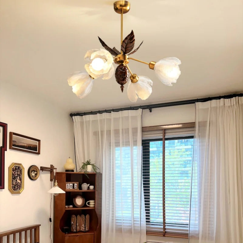 Modern chandelier in a room with curtains and decor