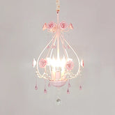 Close-up of a pink floral crystal pendant light with rose accents and cascading droplets.