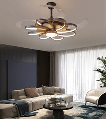 Modern ceiling light fixture in a living room setting with furniture and decor.