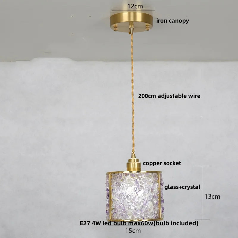 Gold pendant light with measurements on a white background