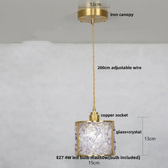 Gold pendant light with measurements on a white background