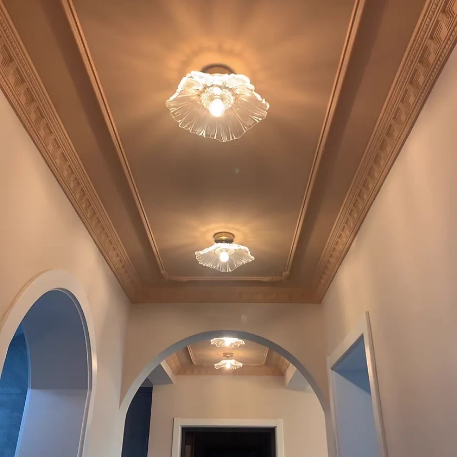 Decorative ceiling with crystal chandeliers in a hallway