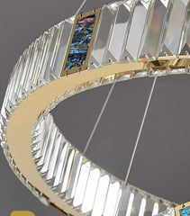 Decorative staircase with crystal banister and gold handrail on a gray background