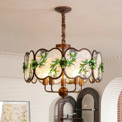 Bronze Chandelier with Frosted Glass and Green Leaf Floral Accents