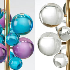 Close-up of the crystal accents on a gold floor lamp, showing colored and clear glass spheres.