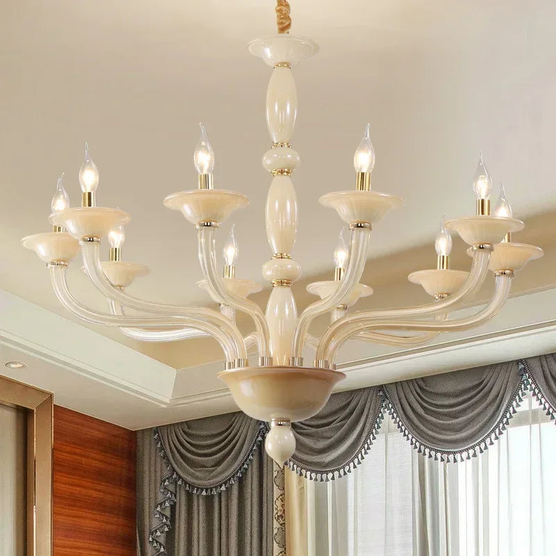View of a champagne ceramic and glass chandelier from a slightly different angle, highlighting its ornate design.