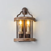 Vintage-style wall sconce with two lit bulbs on a plain background