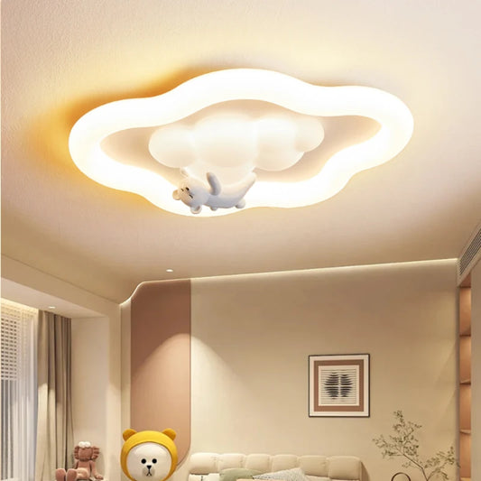 White cloud-shaped flush mount ceiling light with a small cartoon animal figure.