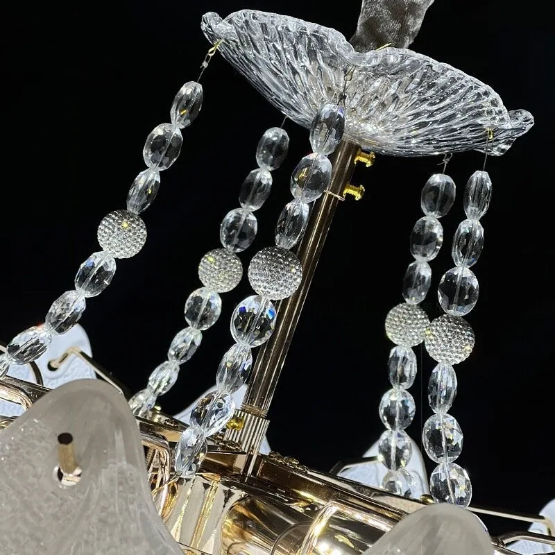 Detailed view of the crystal accents and metal frame of the chandelier