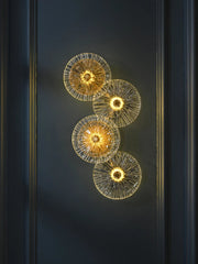 Decorative wall lights with a floral design on a dark background