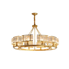Gold chandelier with crystal accents on a white background