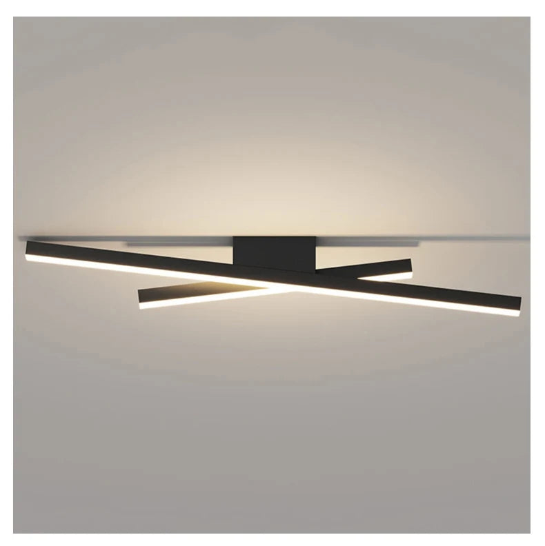 Modern wall-mounted light fixture on a neutral background