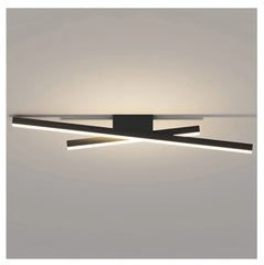 Modern wall-mounted light fixture on a neutral background