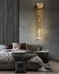 Modern bedroom with a decorative wall light fixture.