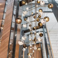 Chandelier with spherical lights in a modern indoor setting