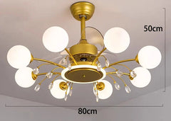 Gold chandelier with white glass shades on a gray background