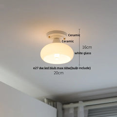 Ceiling light fixture with measurements and bulb information on a ceiling