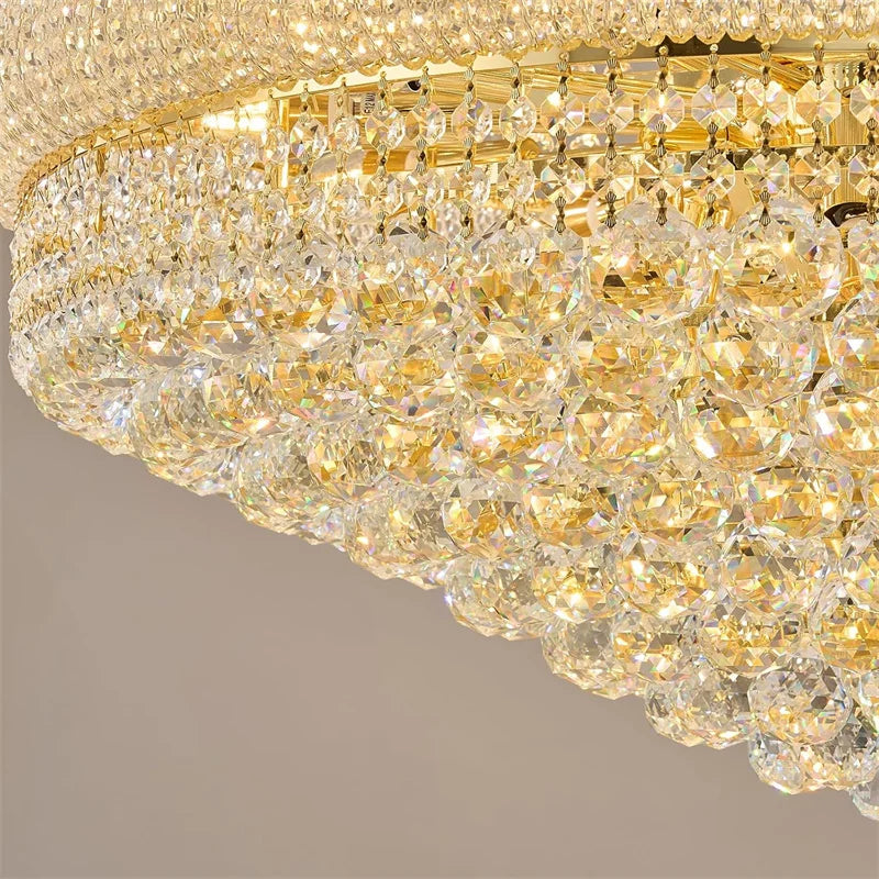 Gold and crystal chandelier on a neutral background