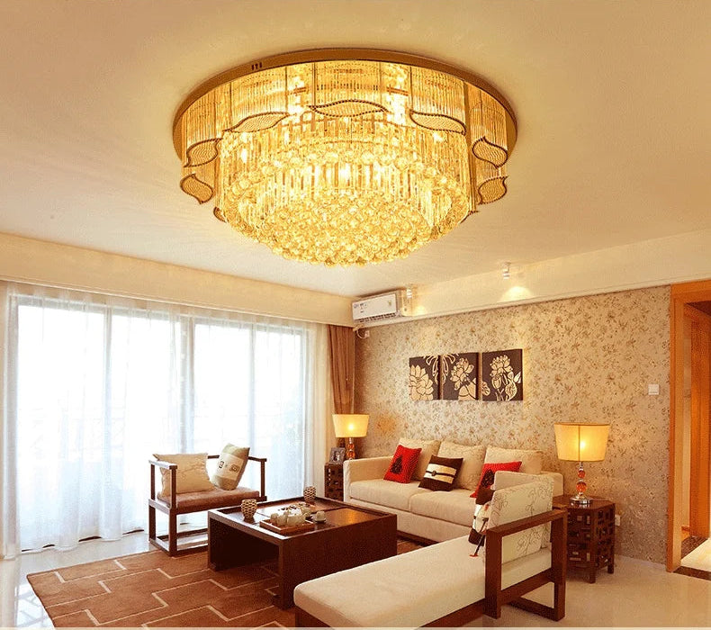 Living room with a chandelier, sofa, and coffee table.